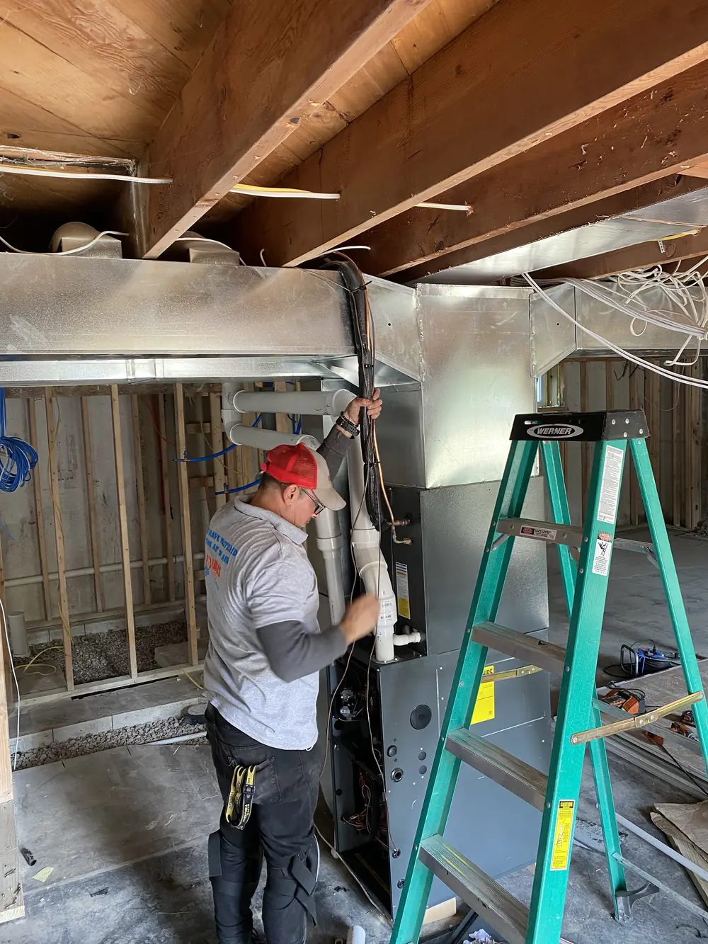 Haha’s technician installing new HVAC ductwork