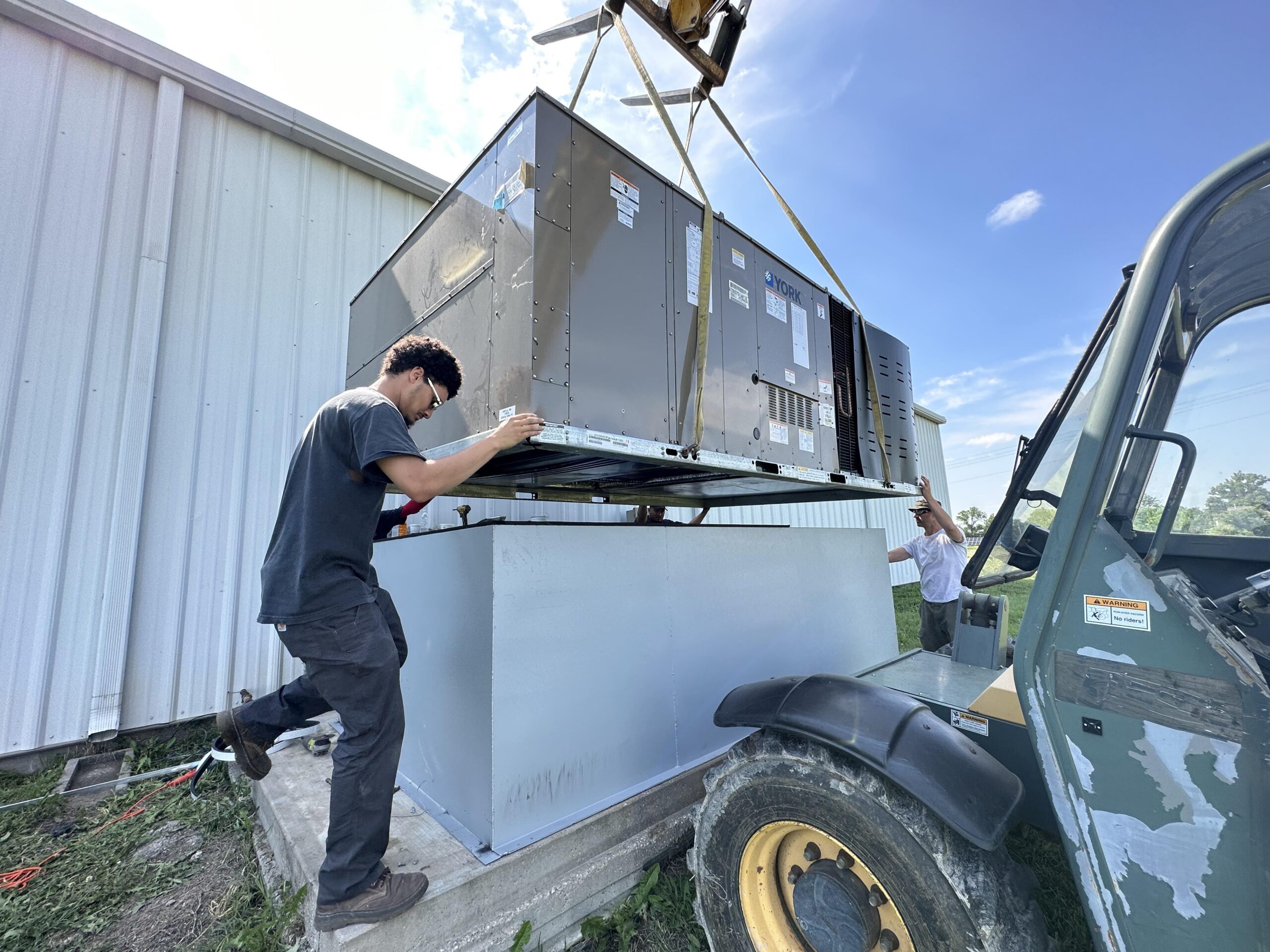 HVAC specialists at work | HVAC Contractor