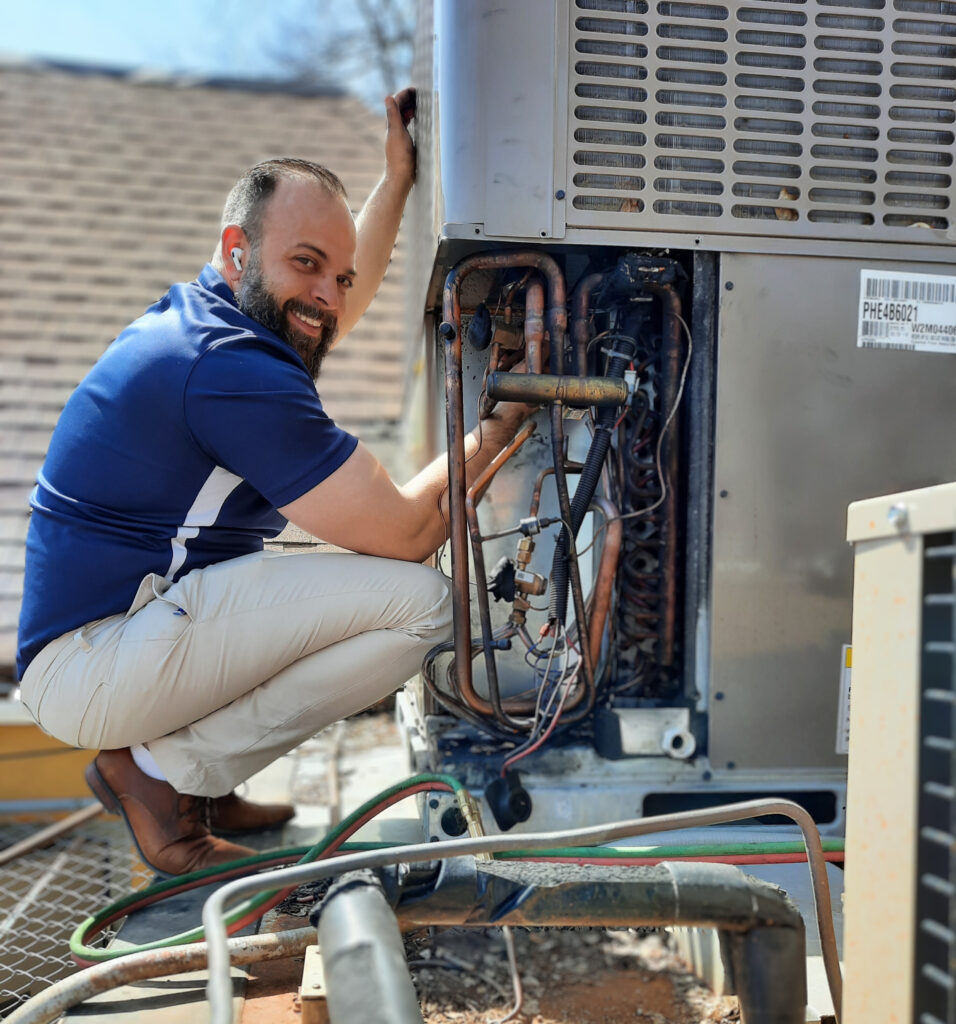 man smiling while working