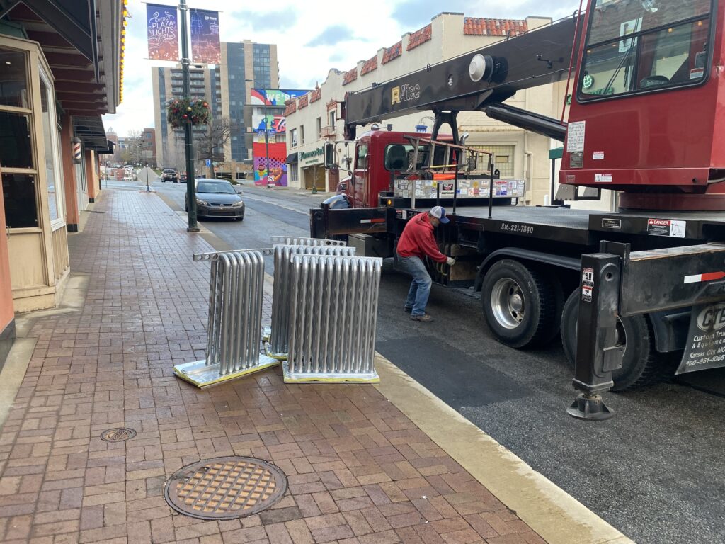 crane dropping HVAC unites in plaza kansas city