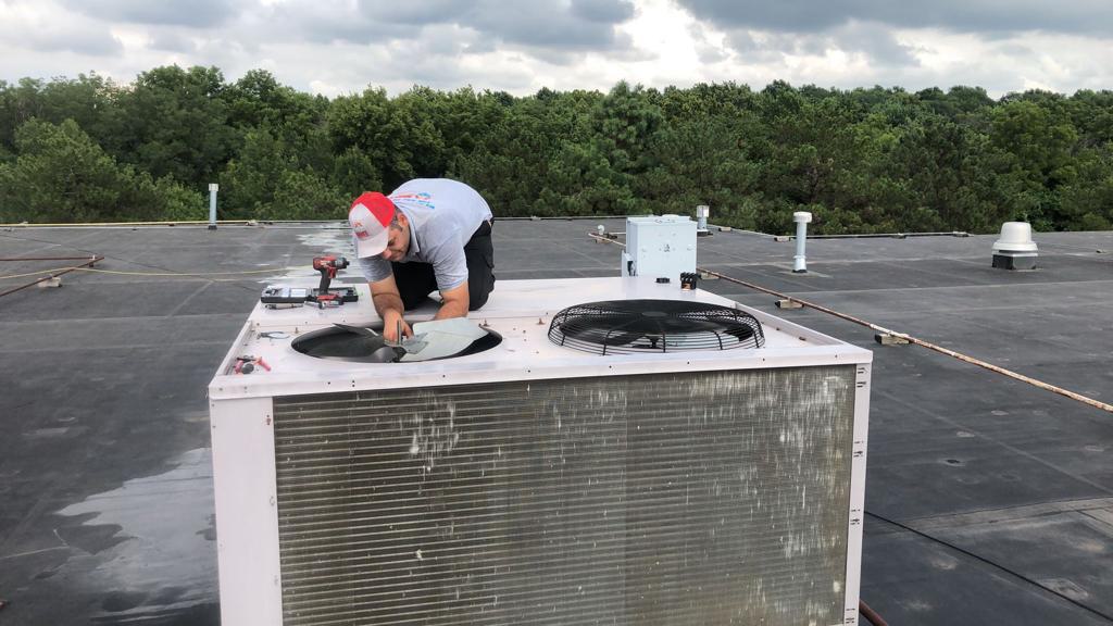 a-man-working-on-a-roof